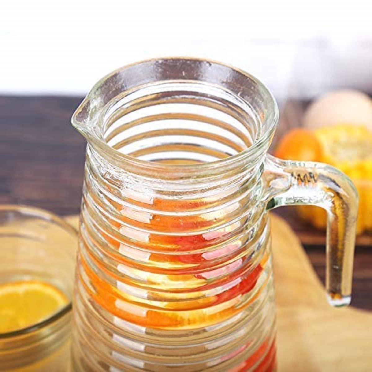 juice pitcher with drinking glasses