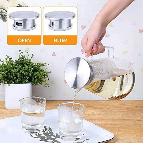 transparent glass beverage jug