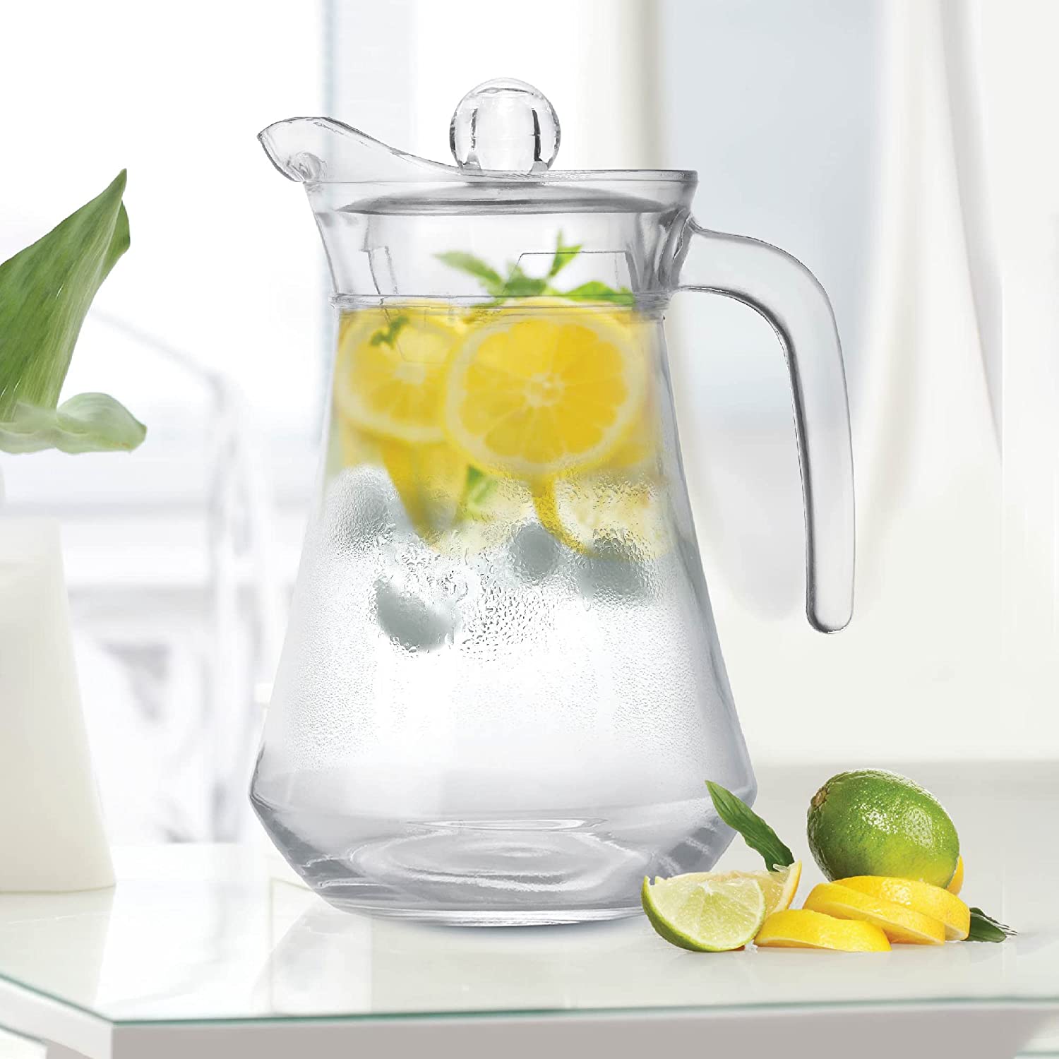 transparent glass drink jug
